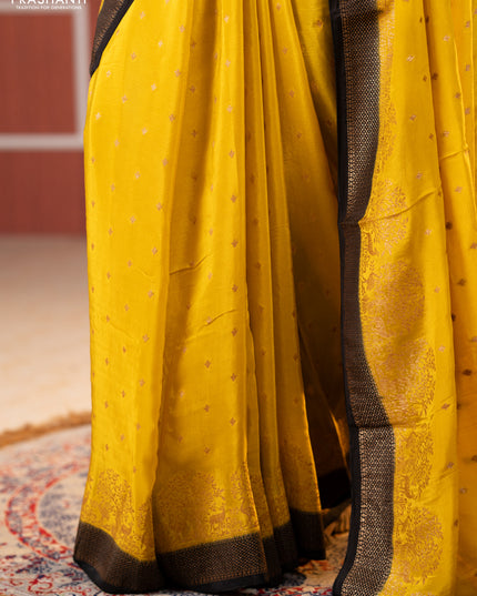 Banarasi chiffon saree mustard yellow and black with allover thread & zari woven buttas and woven border