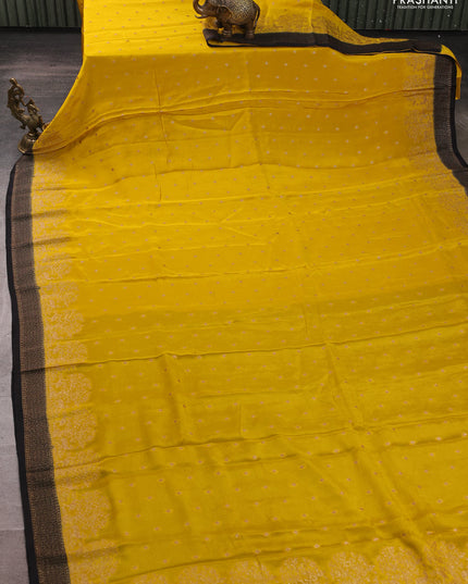 Banarasi chiffon saree mustard yellow and black with allover thread & zari woven buttas and woven border