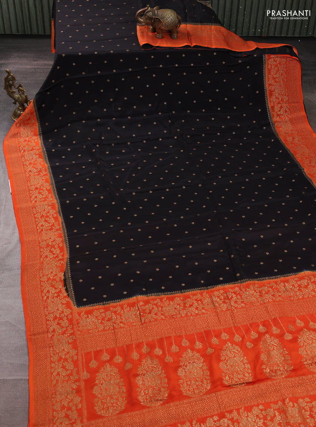 Banarasi semi chiffon saree black and orange with allover thread & zari woven buttas and woven border