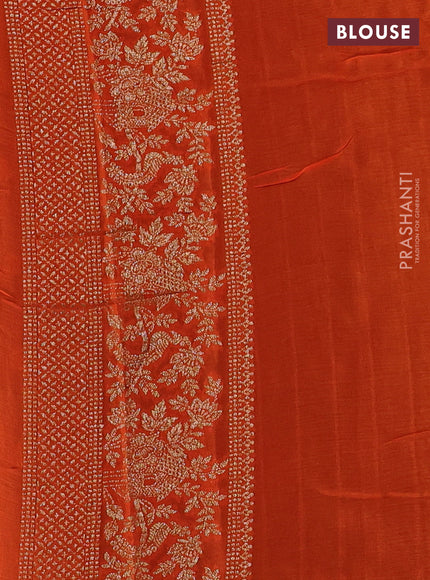 Banarasi semi chiffon saree black and orange with allover thread & zari woven buttas and woven border