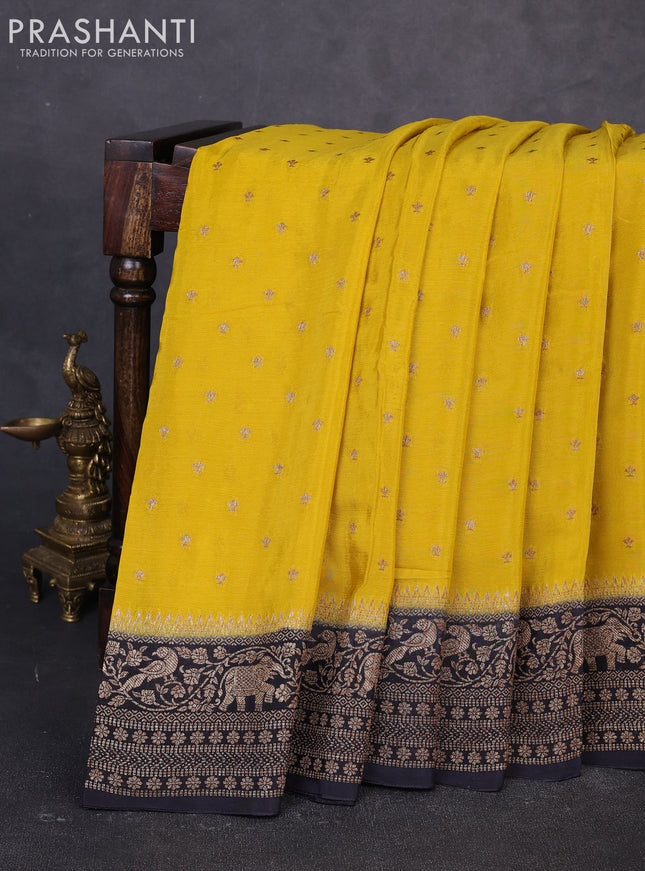Banarasi semi chiffon saree mustard yellow and black with allover thread & zari woven buttas and woven border
