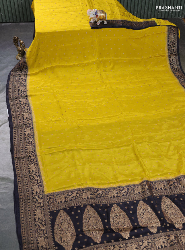 Banarasi semi chiffon saree mustard yellow and black with allover thread & zari woven buttas and woven border
