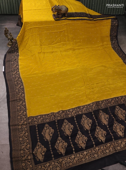 Banarasi semi chiffon saree mustard yellow and black with allover thread & zari woven buttas and woven border
