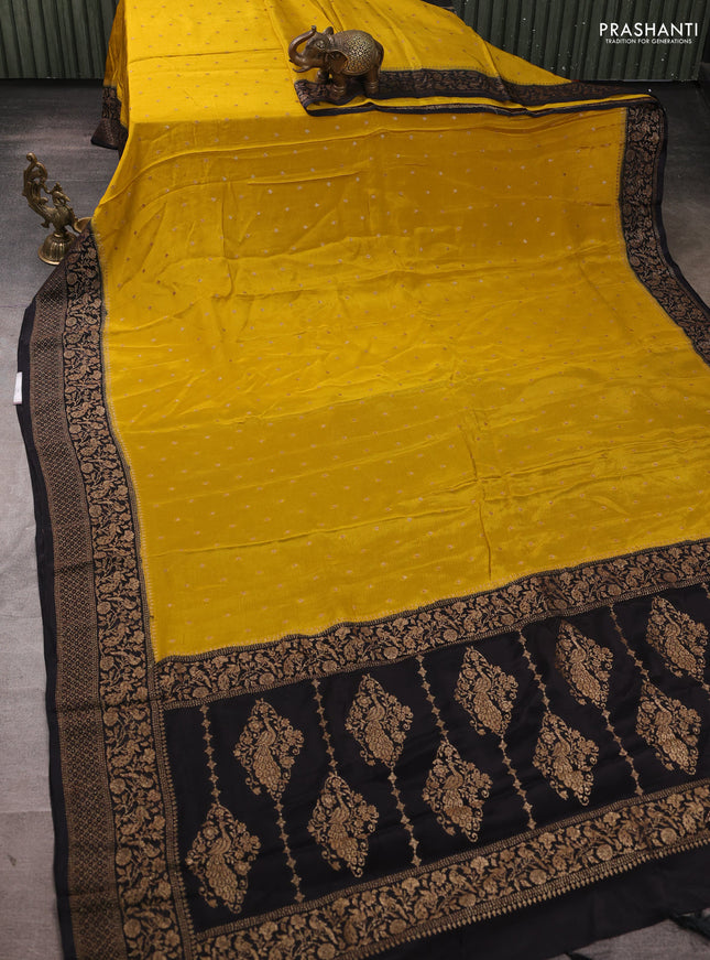 Banarasi semi chiffon saree mustard yellow and black with allover thread & zari woven buttas and woven border