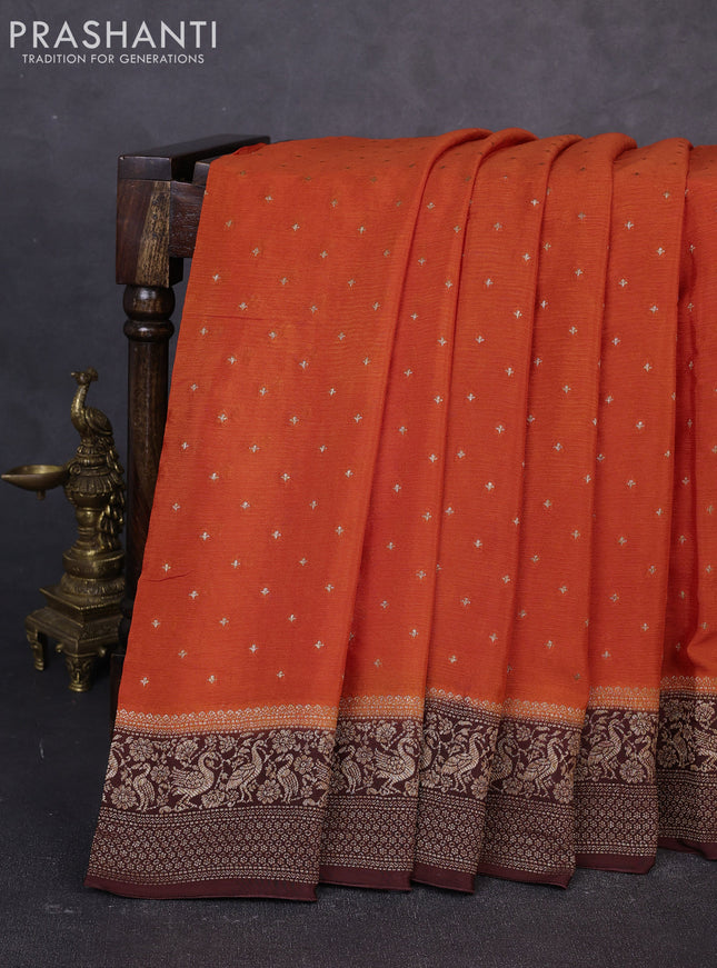 Banarasi semi chiffon saree orange and coffee brown with allover thread & zari woven buttas and woven border