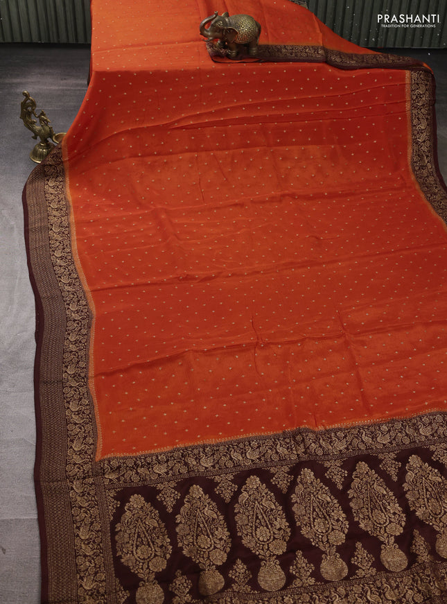 Banarasi semi chiffon saree orange and coffee brown with allover thread & zari woven buttas and woven border