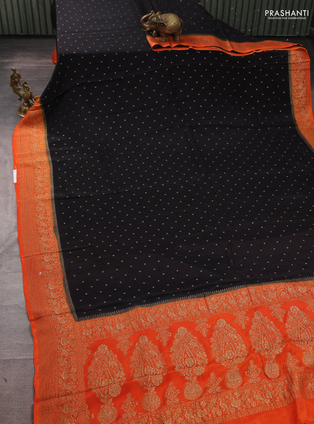 Banarasi semi chiffon saree black and orange with allover thread & zari woven buttas and woven border