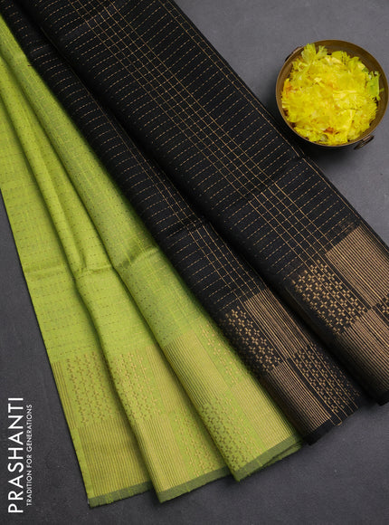 Semi dupion saree lime green and black with allover zari weaves and zari woven border
