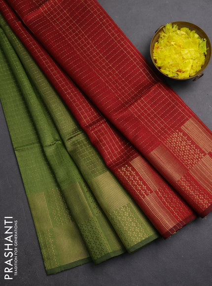 Semi dupion saree light green and maroon with allover zari weaves and zari woven border