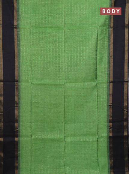 Semi dupion saree light green and black with allover zari weaves and rettapet zari woven border