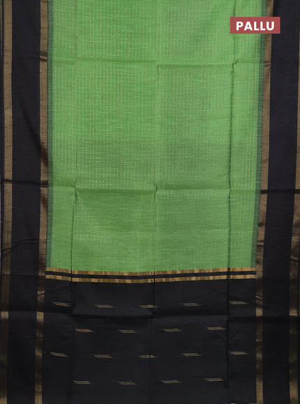 Semi dupion saree light green and black with allover zari weaves and rettapet zari woven border