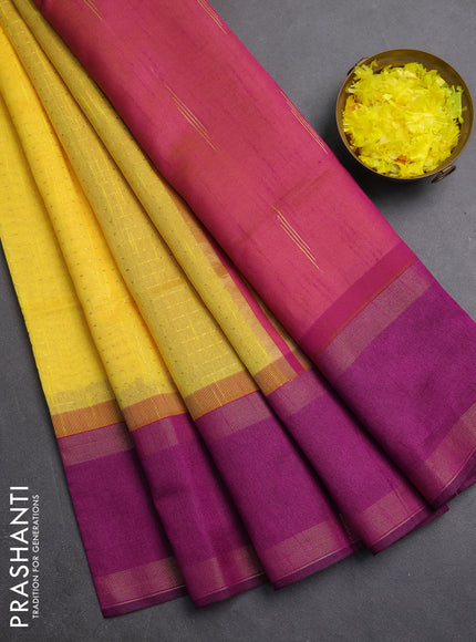 Semi dupion saree yellow and purple with allover zari weaves and rettapet zari woven border