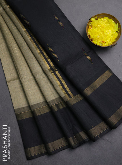 Semi dupion saree dark beige and black with allover zari weaves and rettapet zari woven border