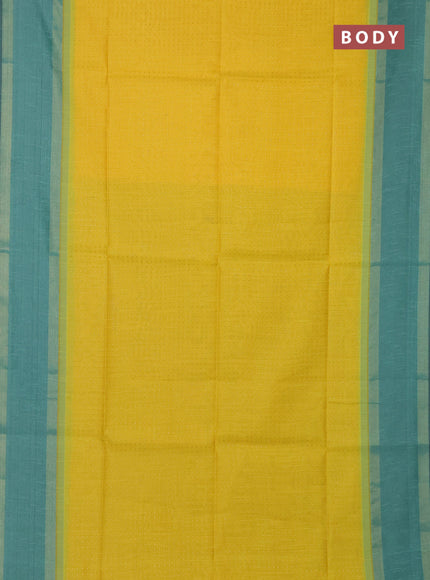 Semi dupion saree yellow and teal green with allover zari weaves and rettapet zari woven border