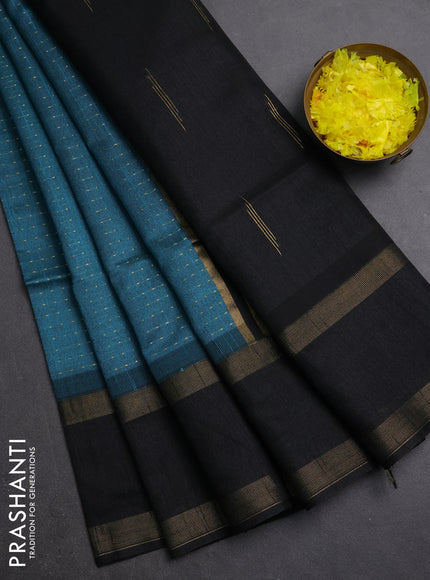 Semi dupion saree peacock blue and black with allover zari weaves and rettapet zari woven border