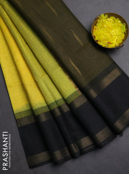 Semi dupion saree yellow and black with allover zari weaves and rettapet zari woven border