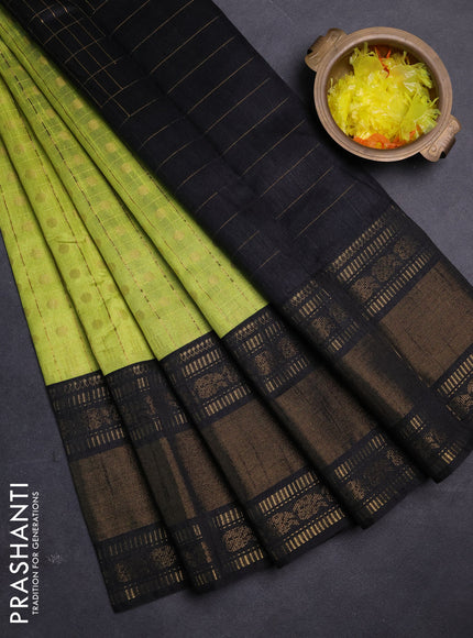 Semi dupion saree lime green and black with allover zari checks & buttas and long rettapet zari woven border