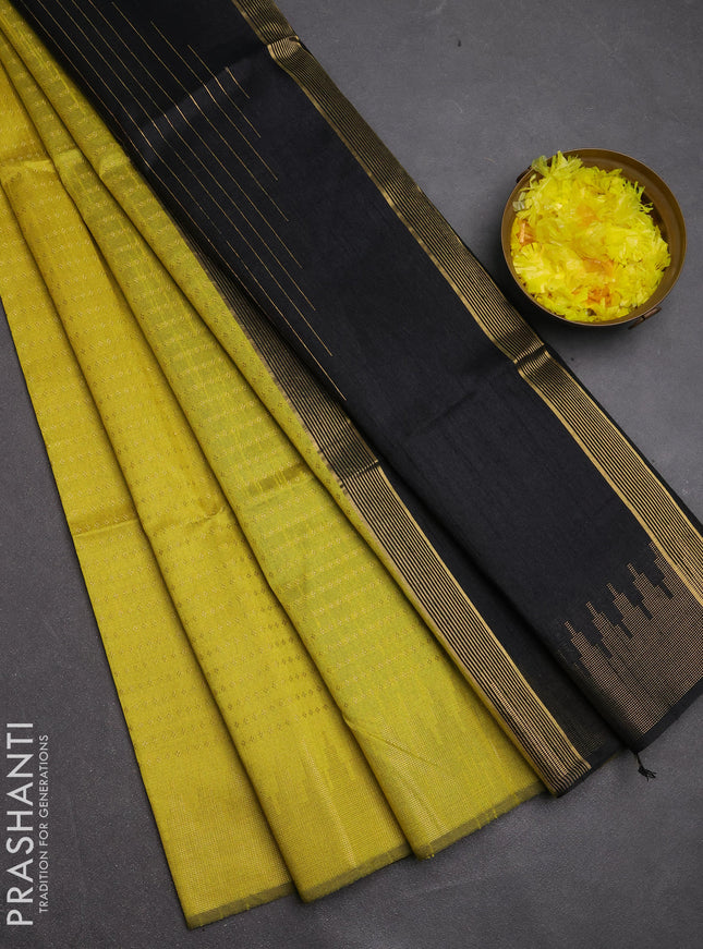 Semi dupion saree lime yellow and black with allover zari woven buttas and temple design zari woven border