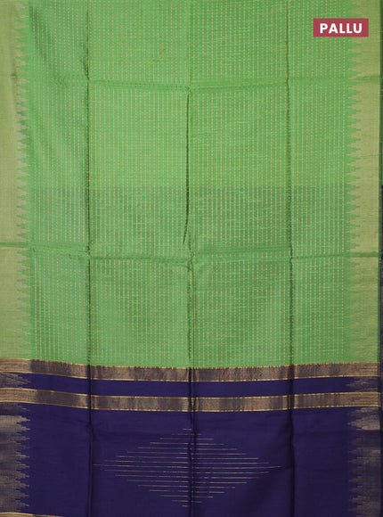 Semi dupion saree green and navy blue with allover zari woven buttas and temple design zari woven border