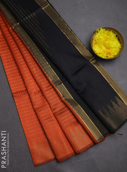 Semi dupion saree orange and black with allover zari woven buttas and temple design zari woven border