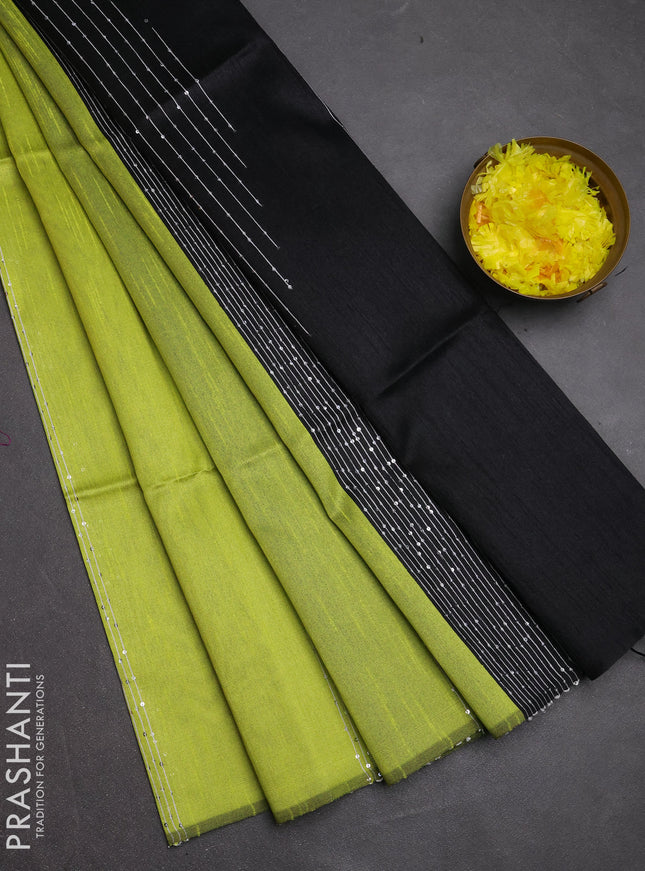 Semi dupion saree fluorescent green and black with allover sequin work in borderless style