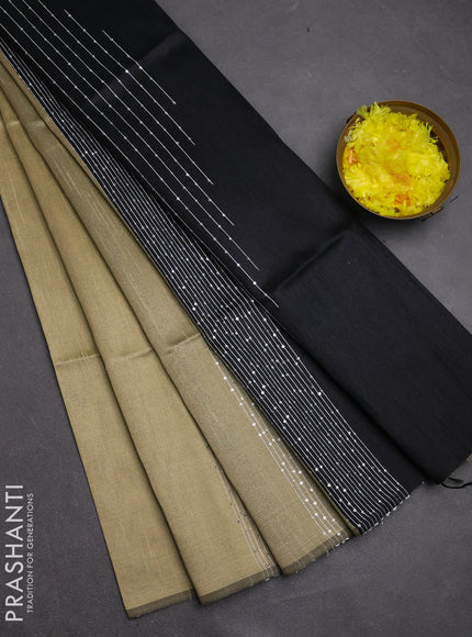 Semi dupion saree beige and black with allover sequin work in borderless style