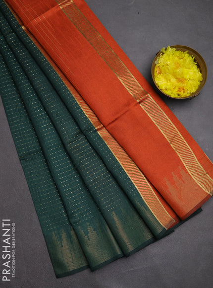 Semi dupion saree bottle green and orange with allover zari woven buttas and temple design zari woven border