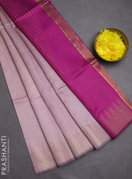 Semi dupion saree pastel pink and purple with allover zari woven buttas and temple design zari woven border