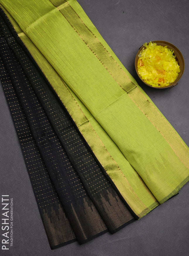 Semi dupion saree black and fluorescent green with allover zari woven buttas and temple design zari woven border
