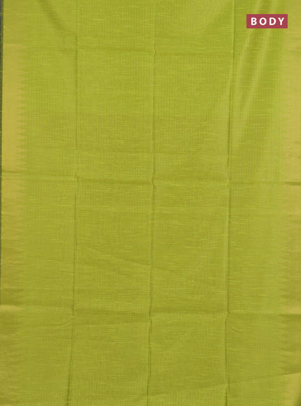Semi dupion saree fluorescent green and purple with allover zari woven buttas and temple design zari woven border