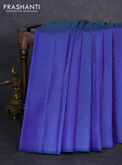 Pure kanchipuram silk saree blue and pink with allover zari small checked pattern in borderless style