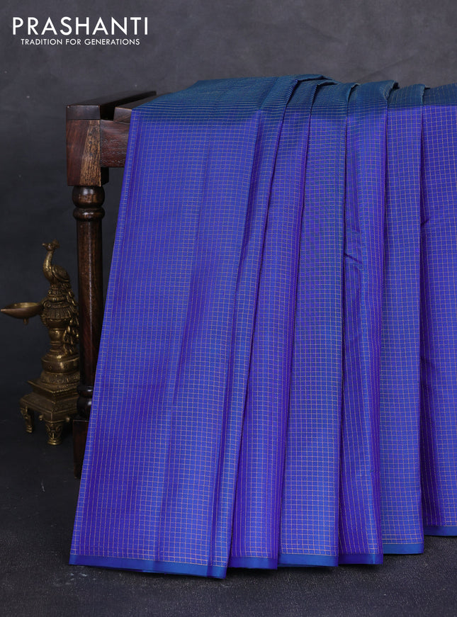 Pure kanchipuram silk saree blue and pink with allover zari small checked pattern in borderless style