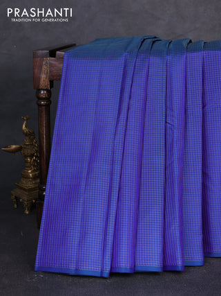 Pure kanchipuram silk saree blue and pink with allover zari small checked pattern in borderless style