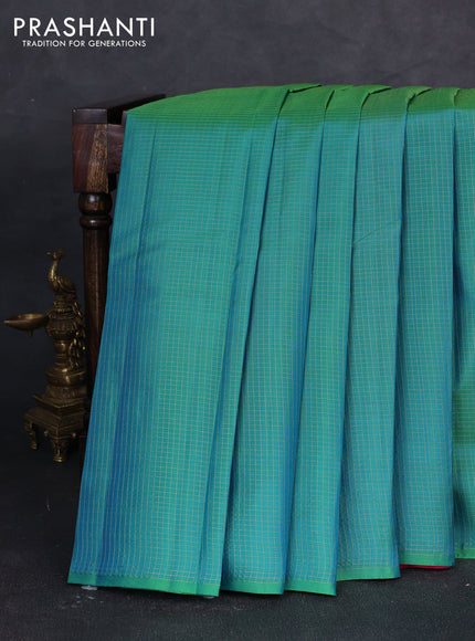 Pure kanchipuram silk saree dual shade of teal green and pink with allover zari small checked pattern in borderless style