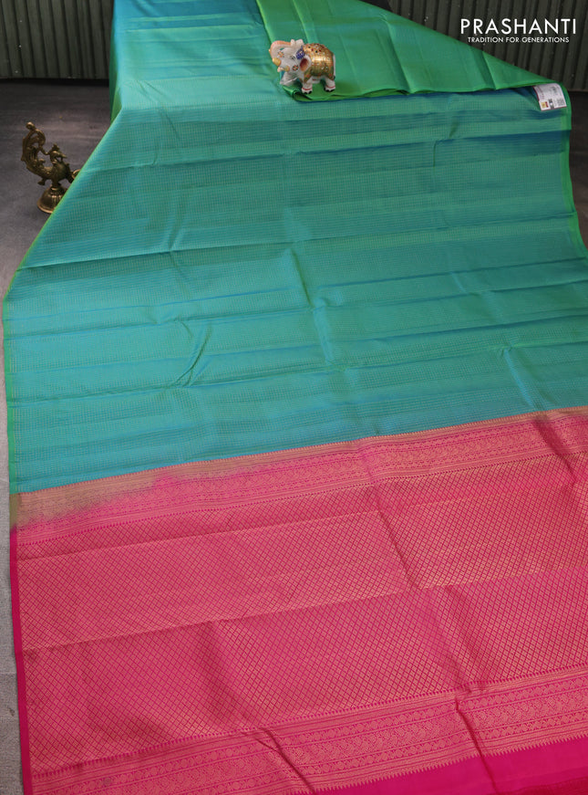 Pure kanchipuram silk saree dual shade of teal green and pink with allover zari small checked pattern in borderless style