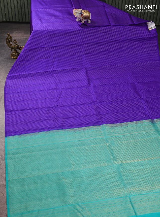 Pure kanchipuram silk saree royal blue and teal green with allover zari checked pattern in borderless style