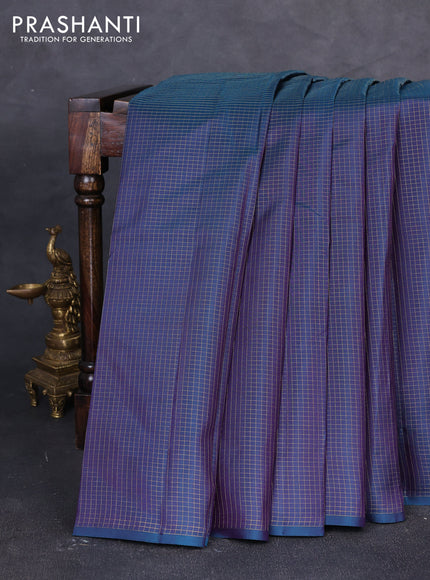 Pure kanchipuram silk saree peacock green and pink with allover zari checked pattern in borderless style