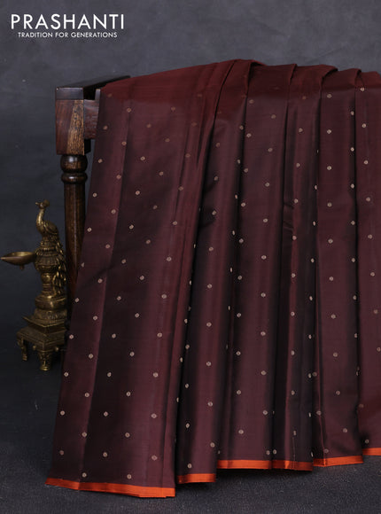 Pure kanchipuram silk saree coffee brown and rustic orange with allover zari woven buttas and piping border