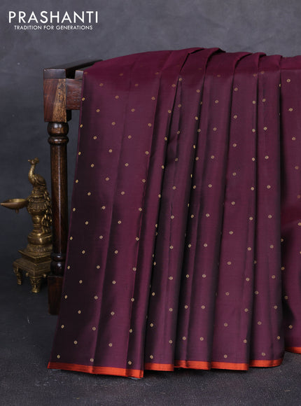 Pure kanchipuram silk saree deep wine shade and rustic orange with allover zari woven buttas and piping border