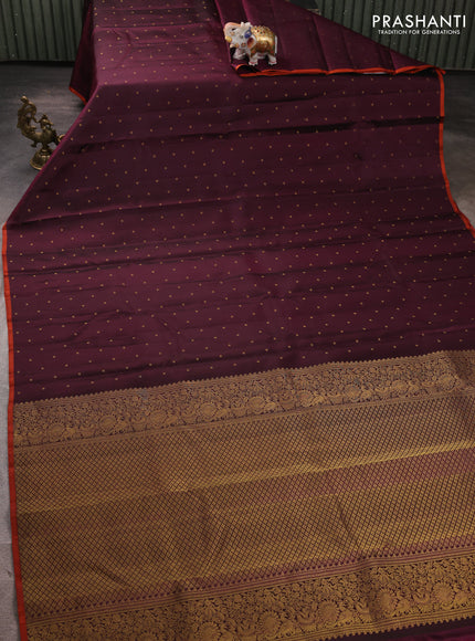 Pure kanchipuram silk saree deep wine shade and rustic orange with allover zari woven buttas and piping border