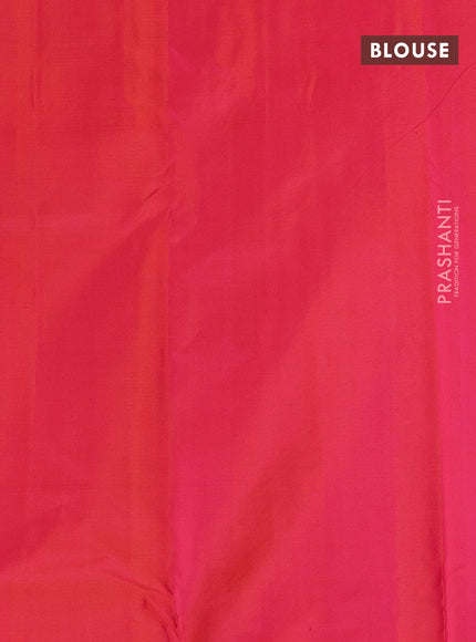 Pure kanchipuram silk saree dual shade of pinkish orange with allover zari woven buttas in borderless style