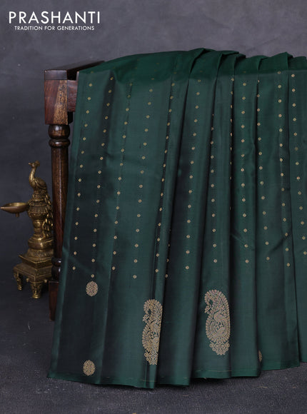 Pure kanchipuram silk saree bottle green with allover zari woven buttas in borderless style