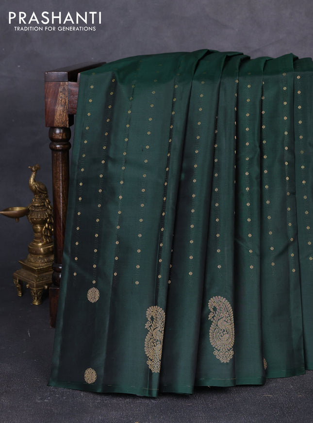 Pure kanchipuram silk saree bottle green with allover zari woven buttas in borderless style