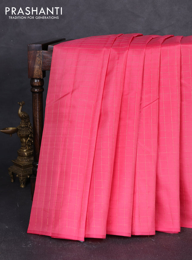 Pure kanchipuram silk saree peach pink with allover zari checked pattern in borderless style