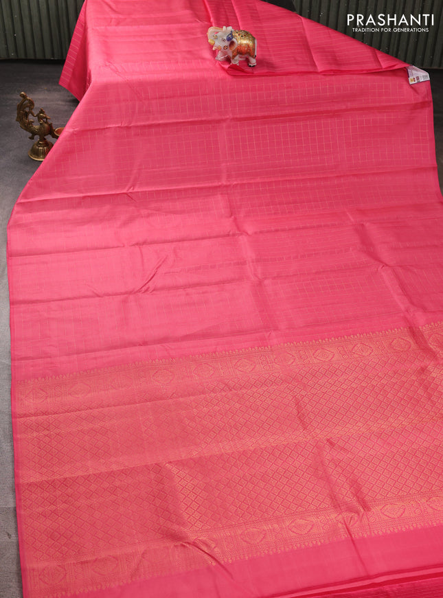 Pure kanchipuram silk saree peach pink with allover zari checked pattern in borderless style