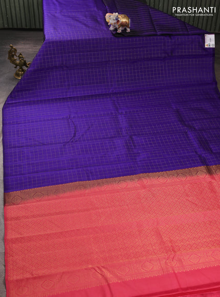 Pure kanchipuram silk saree blue and peach pink with allover zari checked pattern in borderless style
