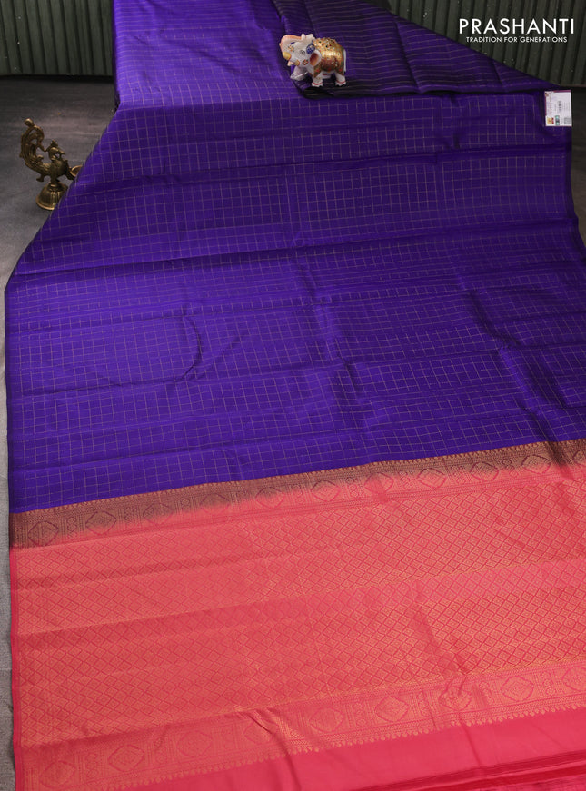 Pure kanchipuram silk saree blue and peach pink with allover zari checked pattern in borderless style