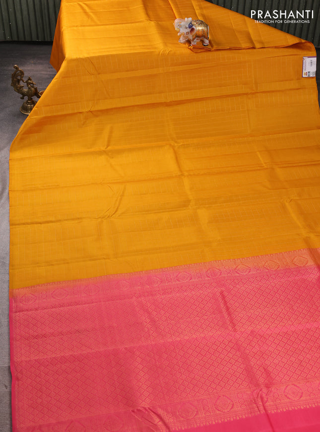Pure kanchipuram silk saree mustard yellow and peach pink with allover zari checked pattern in borderless style