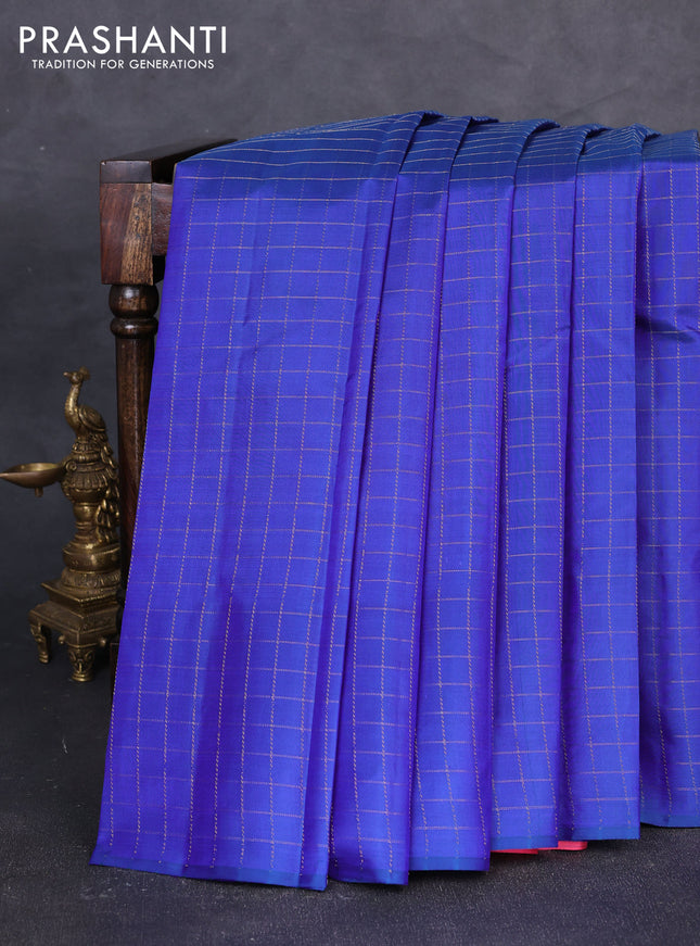 Pure kanchipuram silk saree blue and peach pink with allover zari checked pattern in borderless style