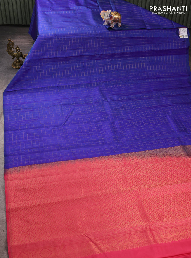 Pure kanchipuram silk saree blue and peach pink with allover zari checked pattern in borderless style